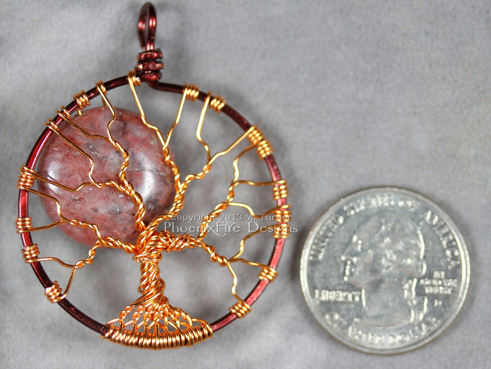 This Red Lodolite Autumn Harvest Full Moon Tree of Life pendant is wrapped in two tone brown and copper wire. Also known as Garden Quartz, Lodalite, Lodelite, and Inclusion Quartz as well.