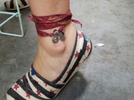 Another PhoenixFire Designs happy customer at Tampa Indie Flea who immediately put on her vintage recycled sari silk wrap bracelet as an anklet!